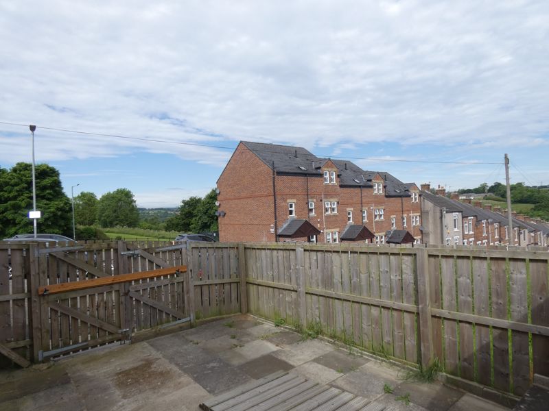 Paved garden to the side- click for photo gallery